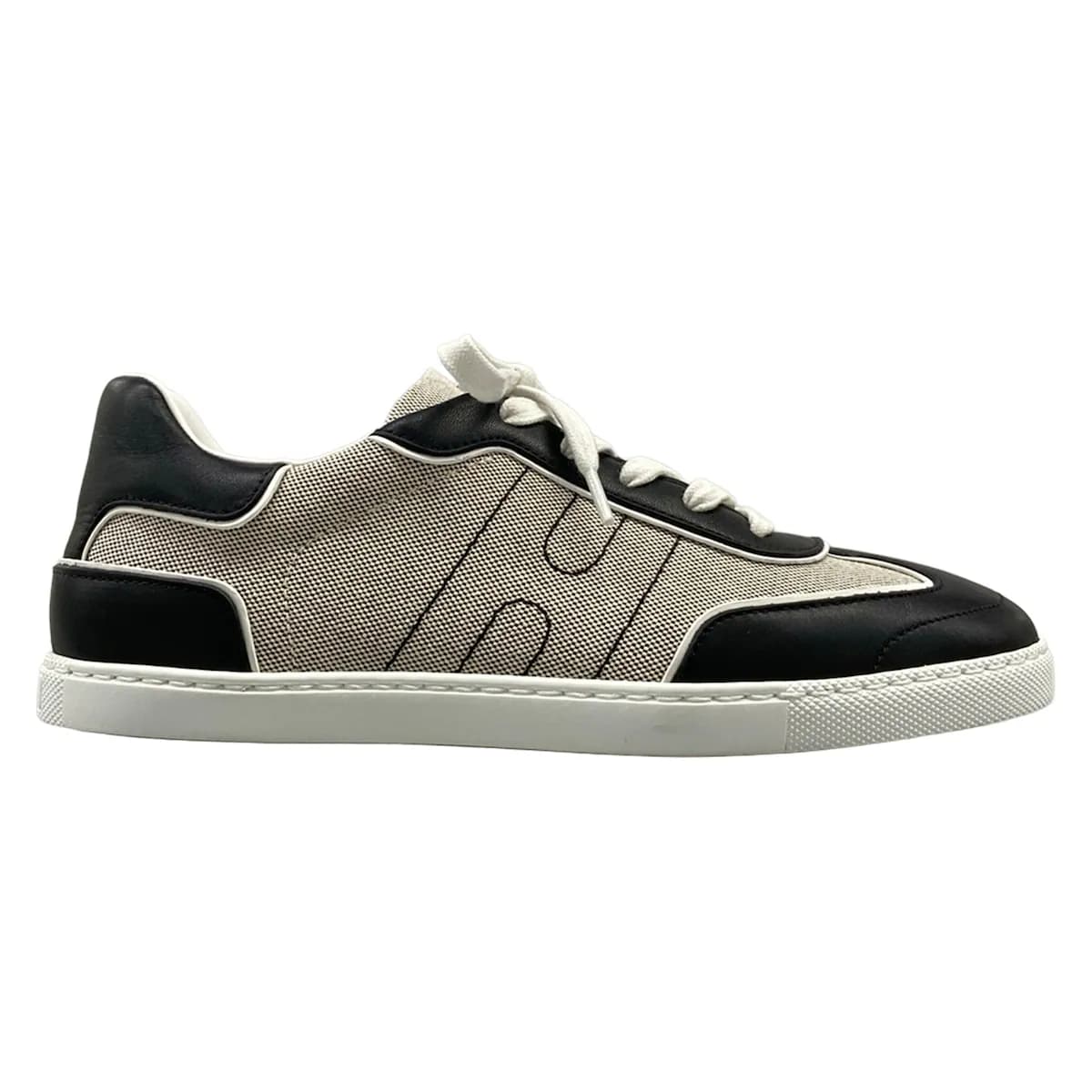 Pair of low-top sneakers photographed from the side.