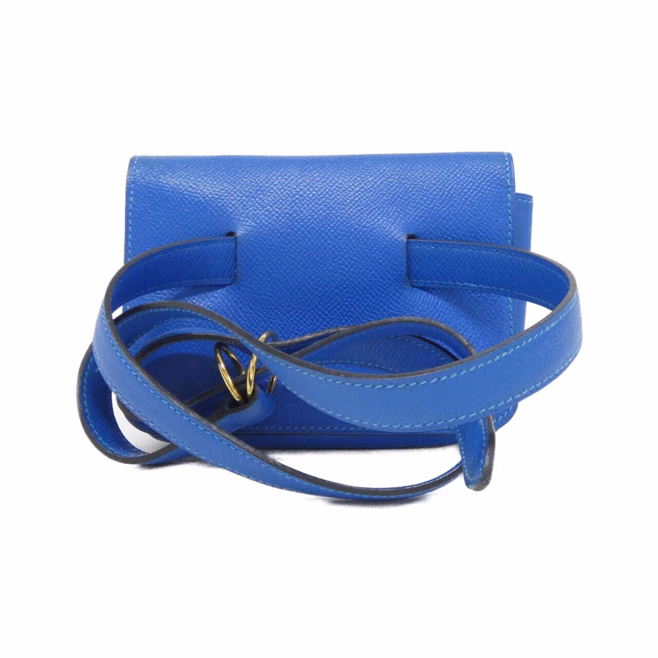 Small green belt bag with buckled strap.
