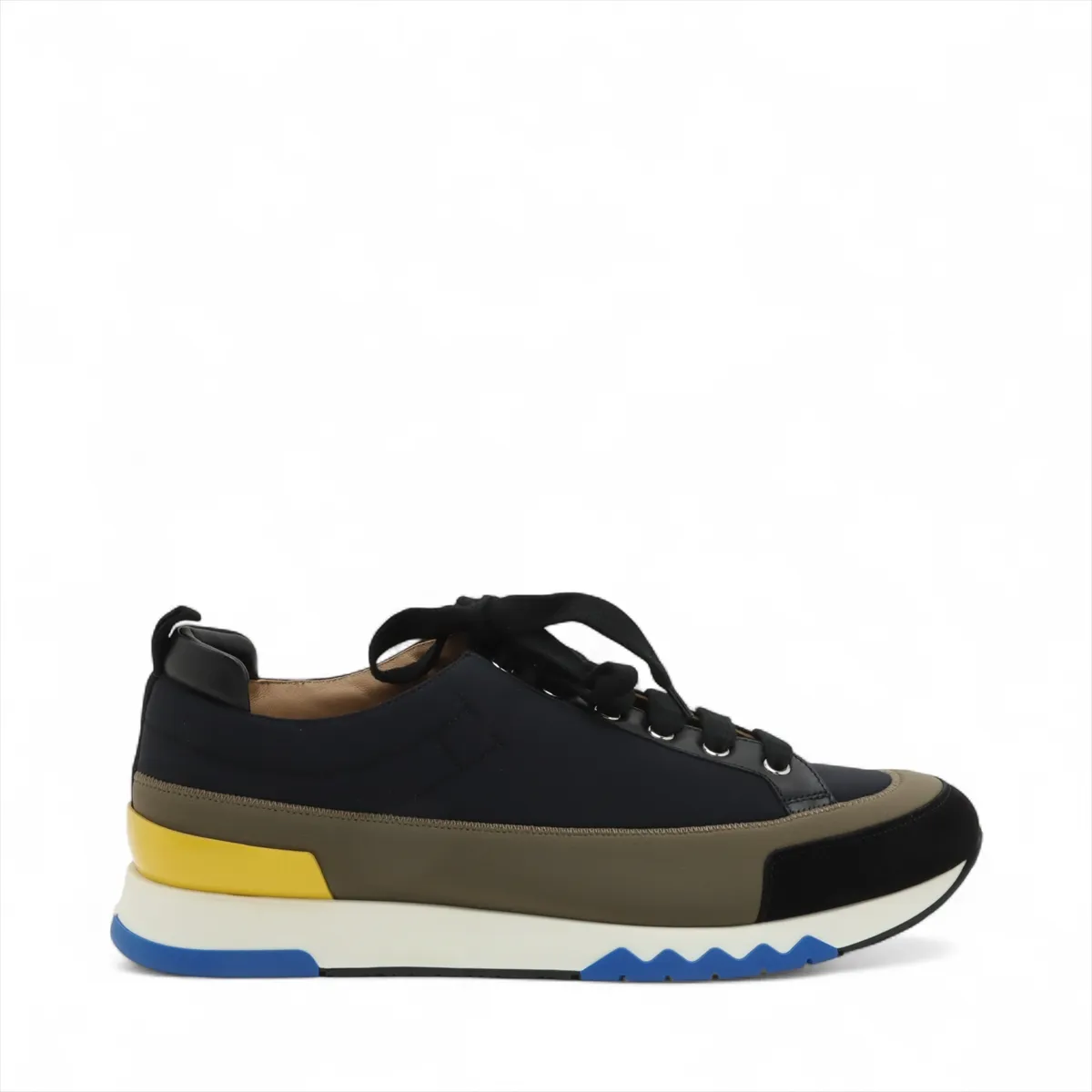 Black and khaki fabric low-top sneaker with contrast panels and a white sole.