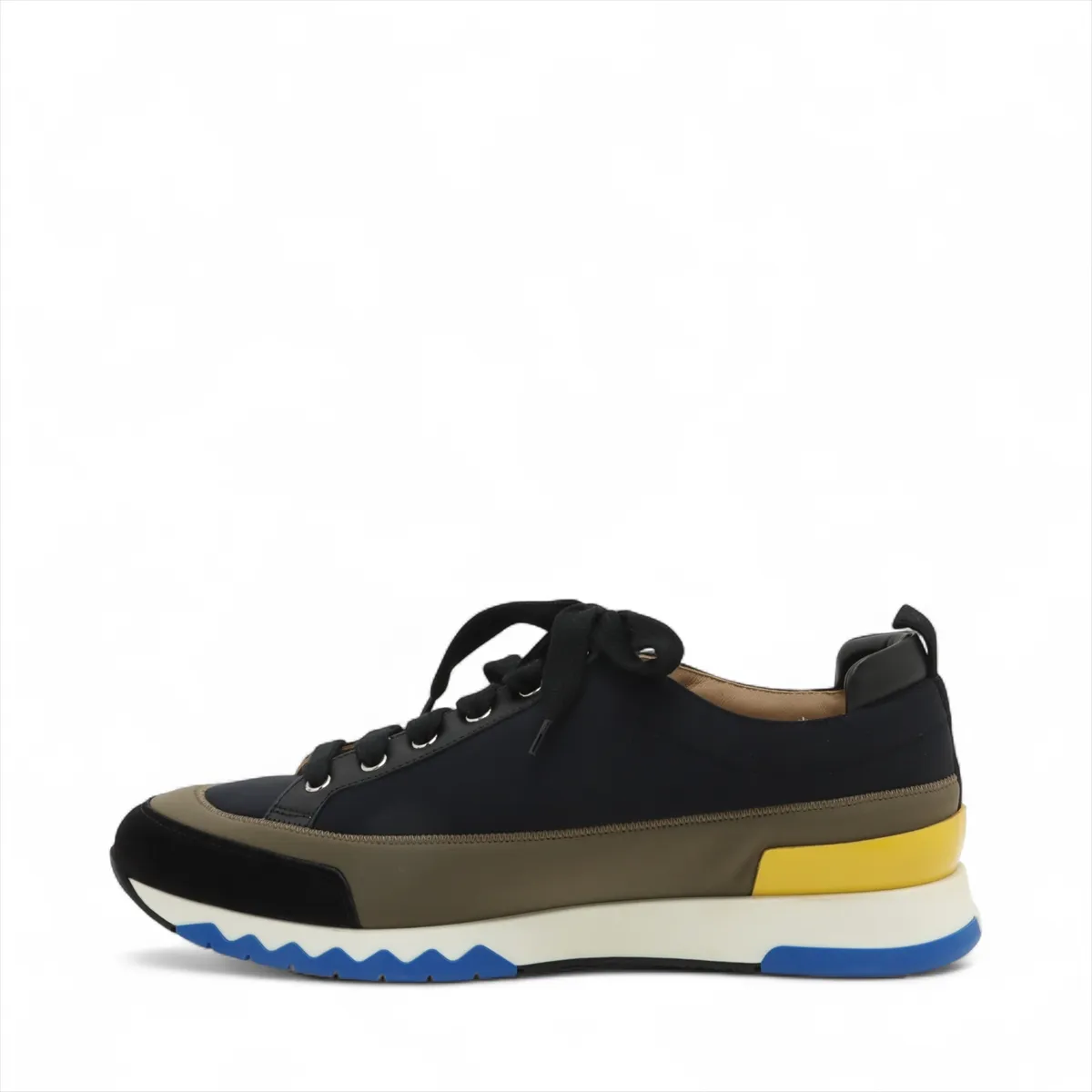 Black and khaki fabric low-top sneaker with contrast panels and a white sole.