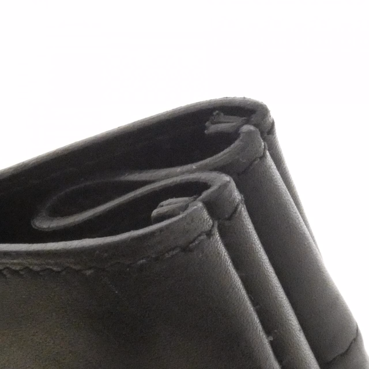 Canvas tote bag with leather-trimmed handles, shown upright.