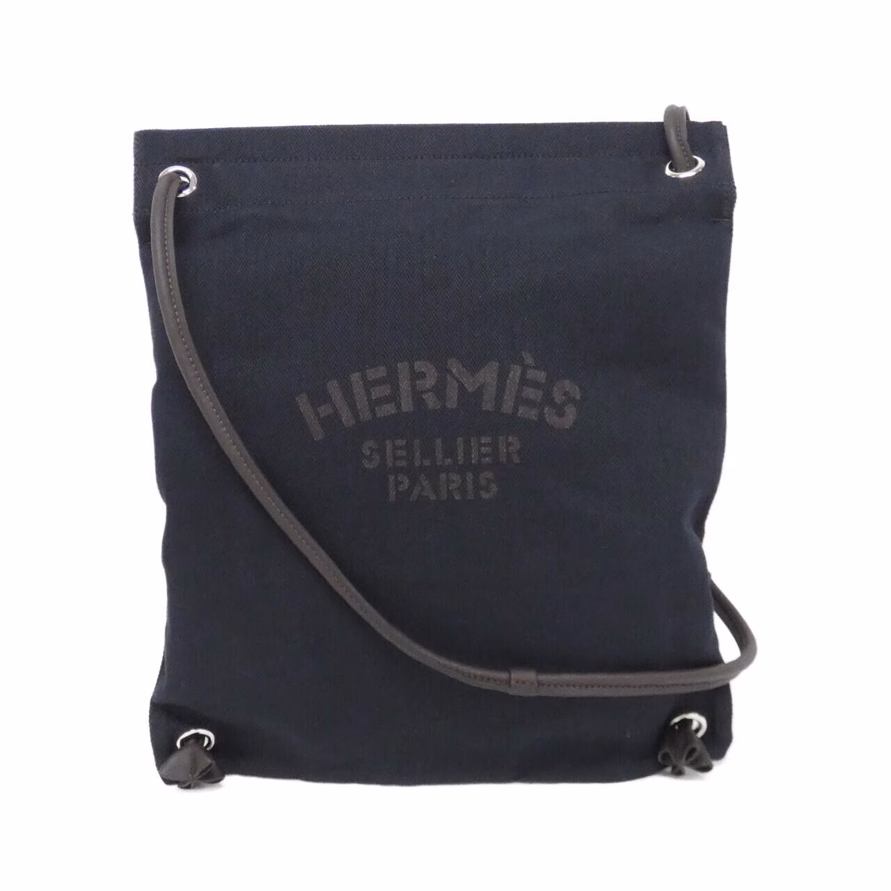 Shoulder bag with a long strap photographed against a plain background.