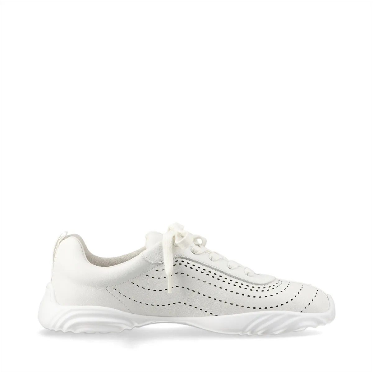 White leather sneakers with bright neon trim details and white soles