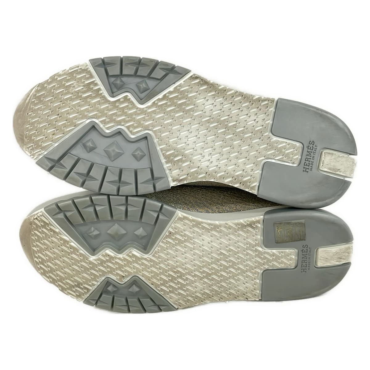 Low-top sneakers in white with metallic silver and gold panels.