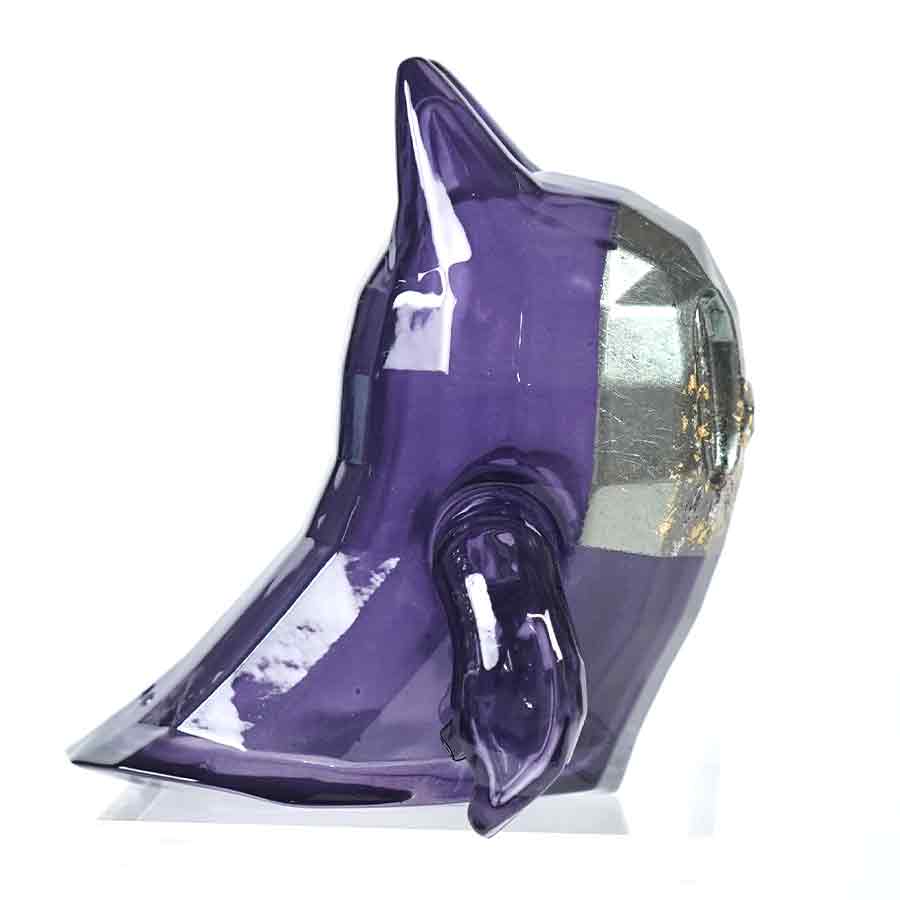 Small ghost-cat figure finished in purple checkerboard lacquer with metallic gold gradation.