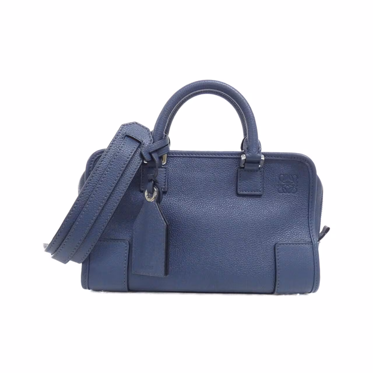 Structured handbag with short rolled handles and a top zip closure
