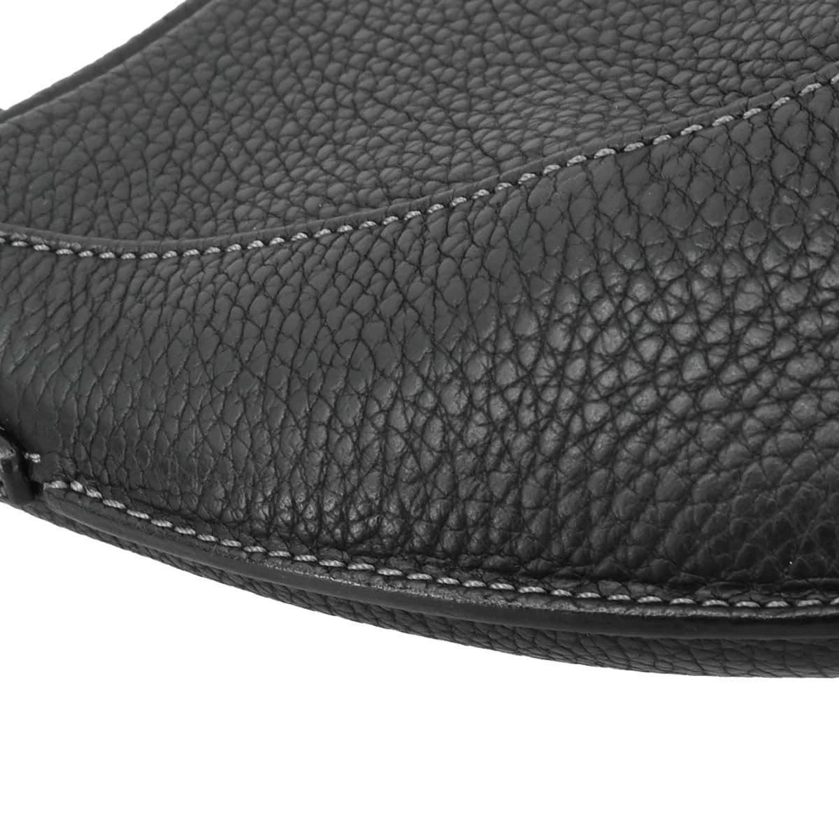 Slouchy black leather shoulder bag with a single strap.