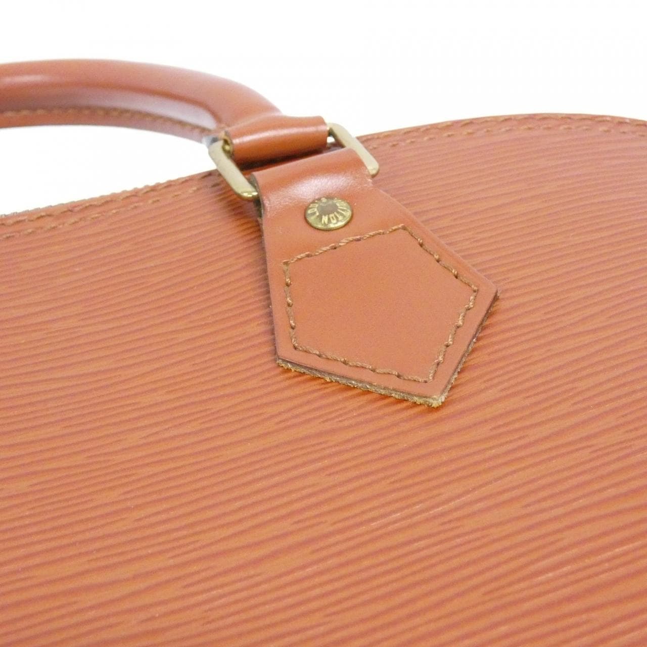 Structured dome-shaped handbag in textured leather with twin handles and a zip top.