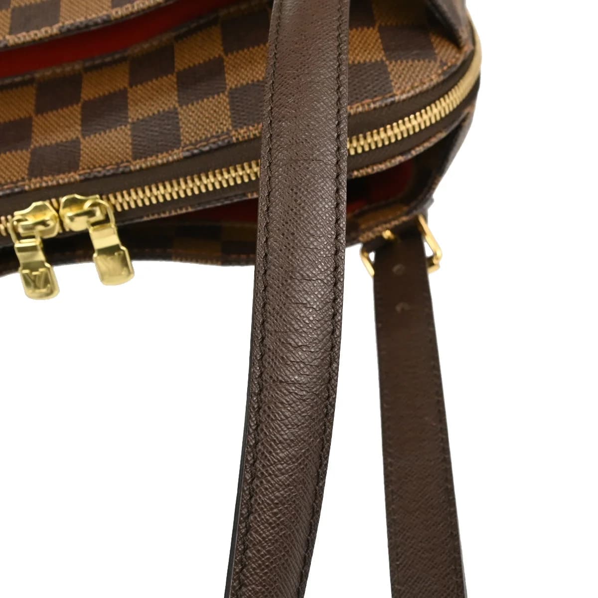 Brown checked coated canvas handbag with rolled leather handles and a zip top
