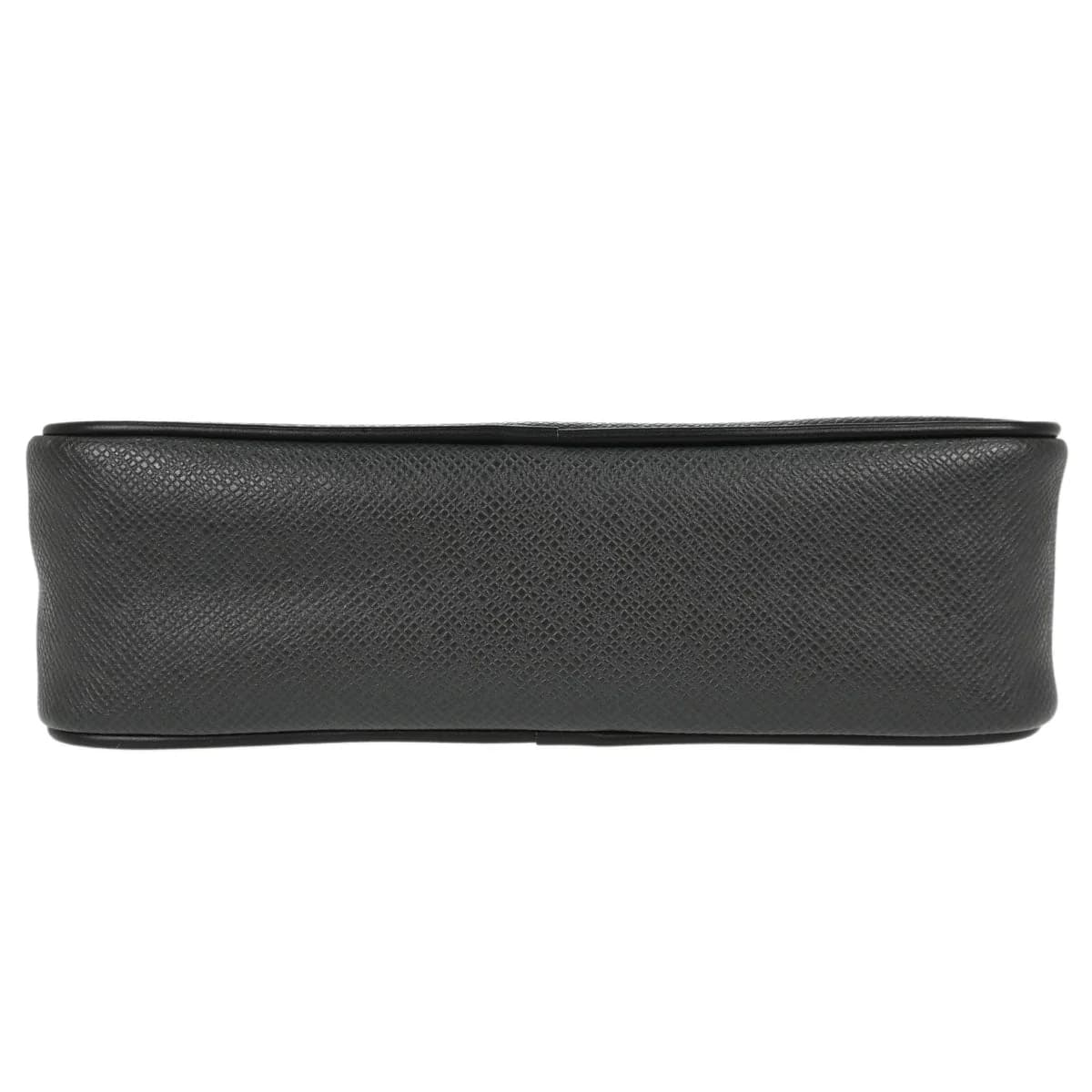 Flat black grained leather clutch with a zip closure and a wrist strap.