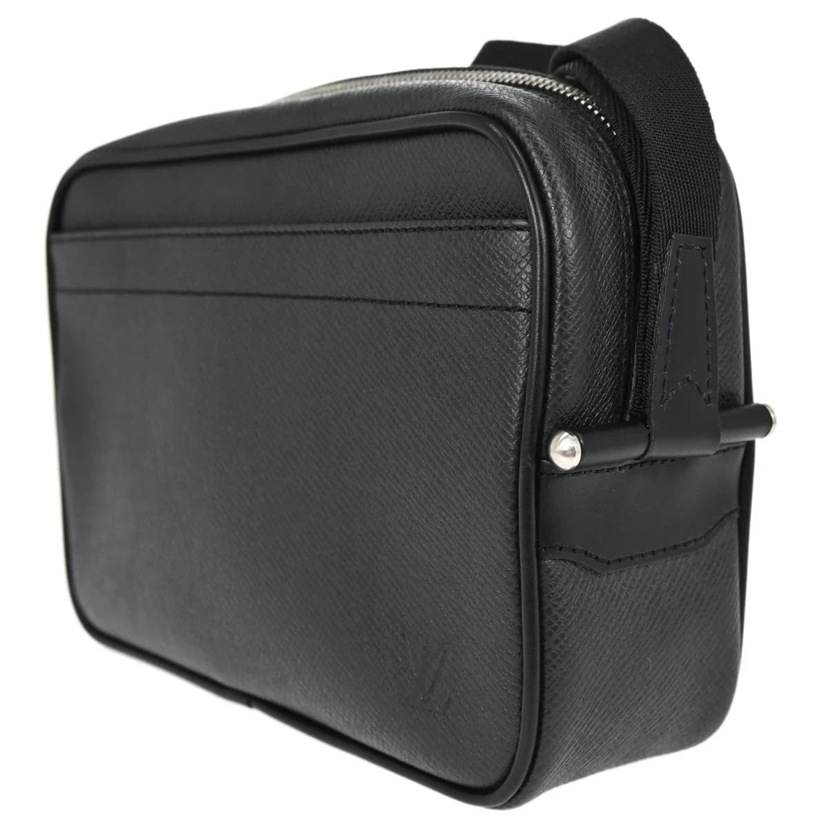 Flat black grained leather clutch with a zip closure and a wrist strap.