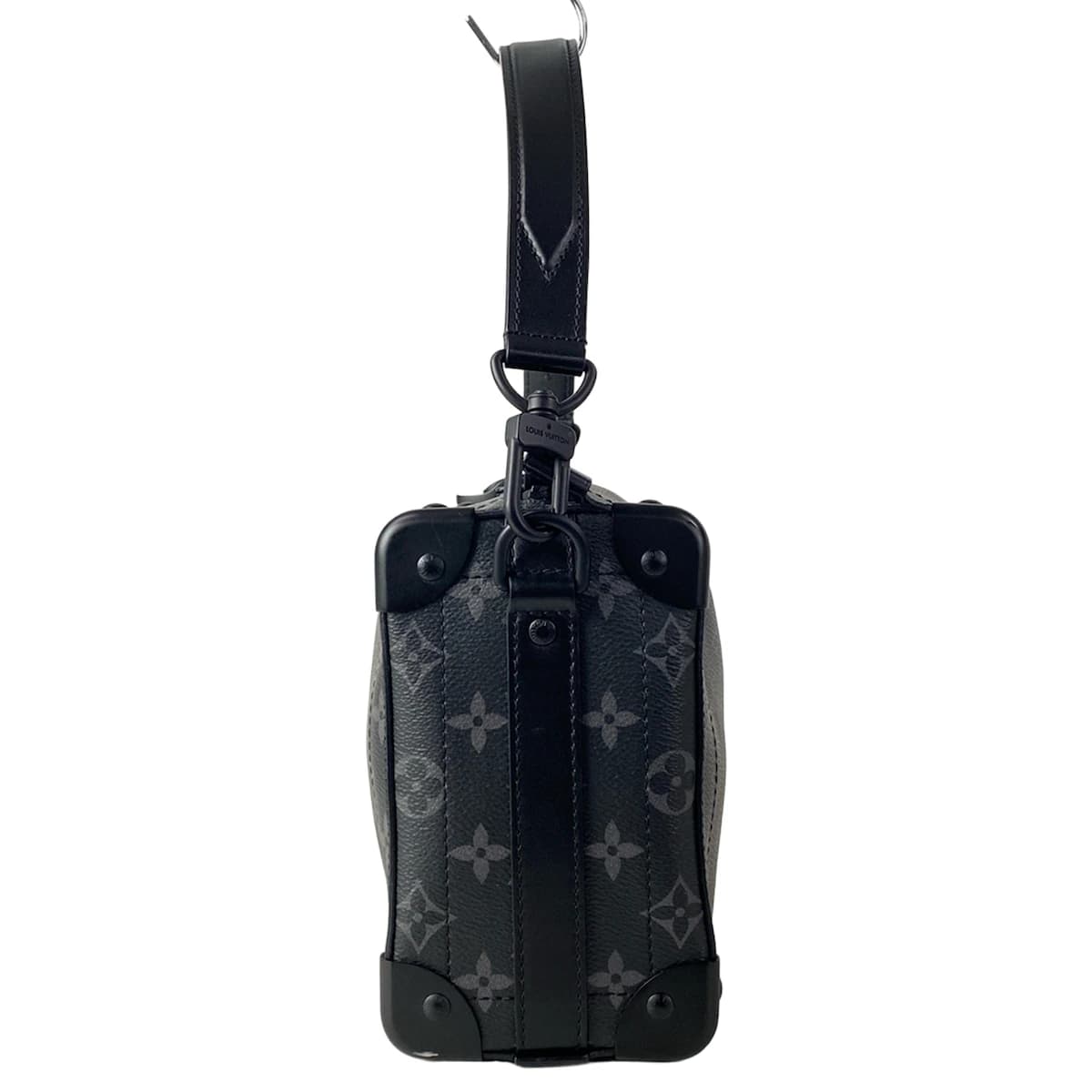 Grey and black patterned canvas bag with dark trim, shown against a plain backdrop
