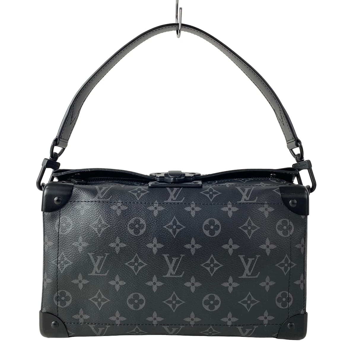 Grey and black patterned canvas bag with dark trim, shown against a plain backdrop