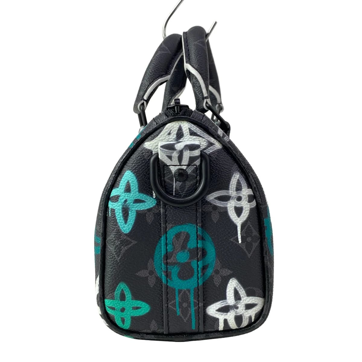 Dark grey and black monogram-patterned canvas bag with black trim.