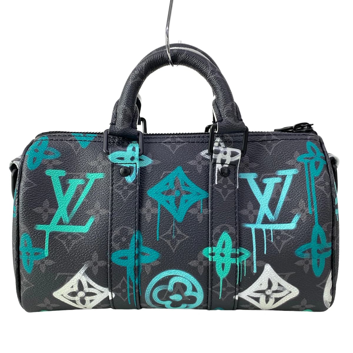 Dark grey and black monogram-patterned canvas bag with black trim.