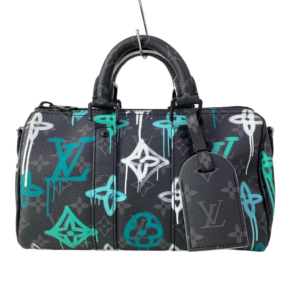 Dark grey and black monogram-patterned canvas bag with black trim.