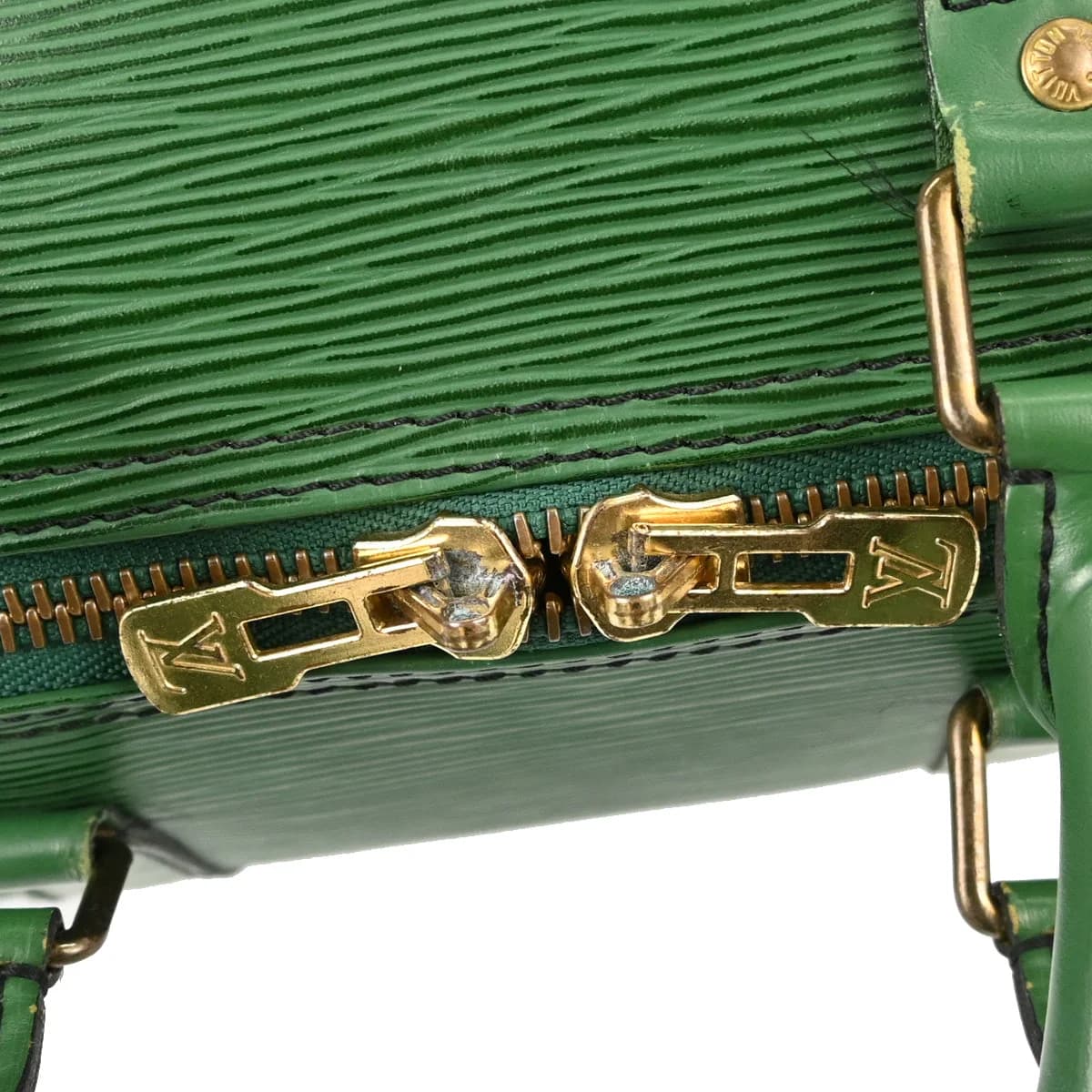 Dark green textured leather duffle bag with twin handles and a zip closure.