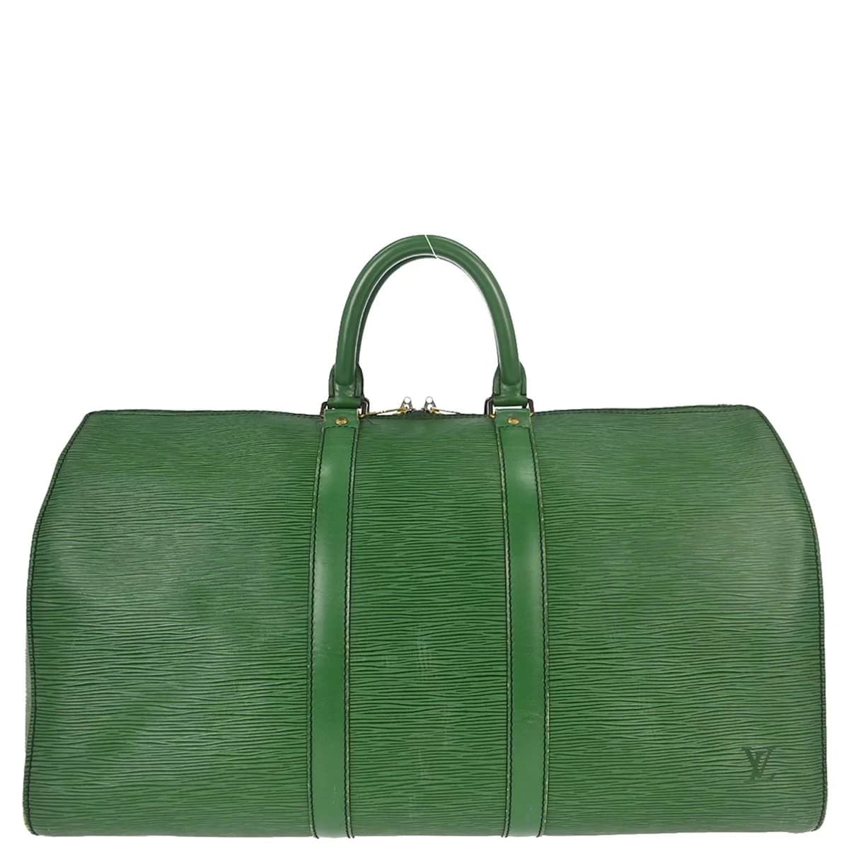 Dark green textured leather duffle bag with twin handles and a zip closure.