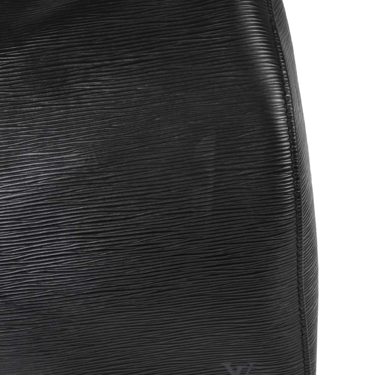 Large black textured-leather duffle bag with twin handles and a zip top.