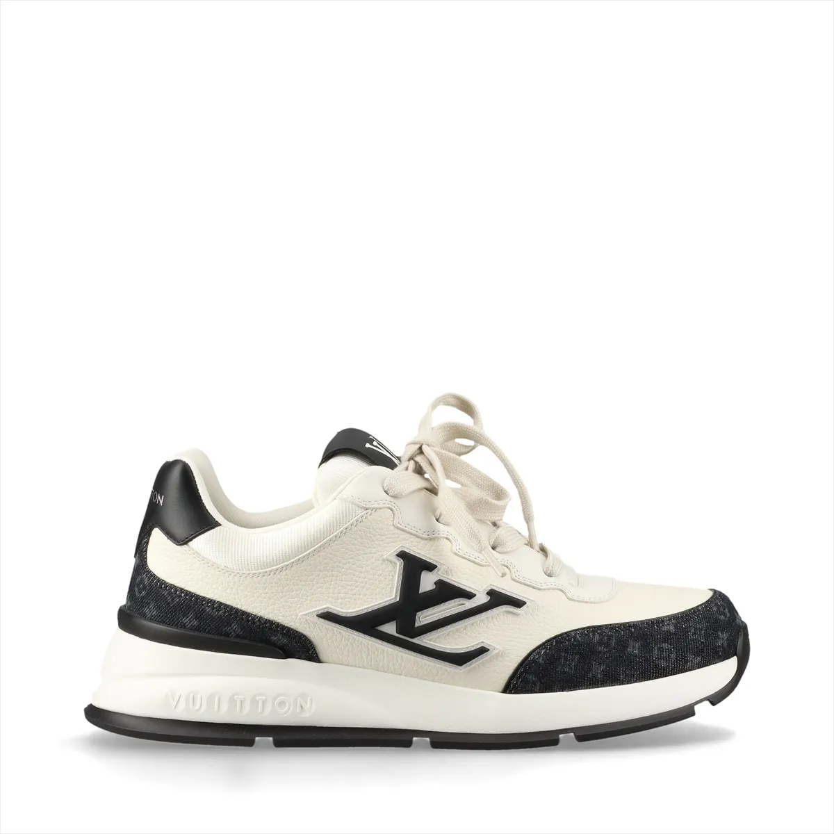 Black and ivory platform-soled sneakers in denim and leather with monogram patterning and a logo at the side.