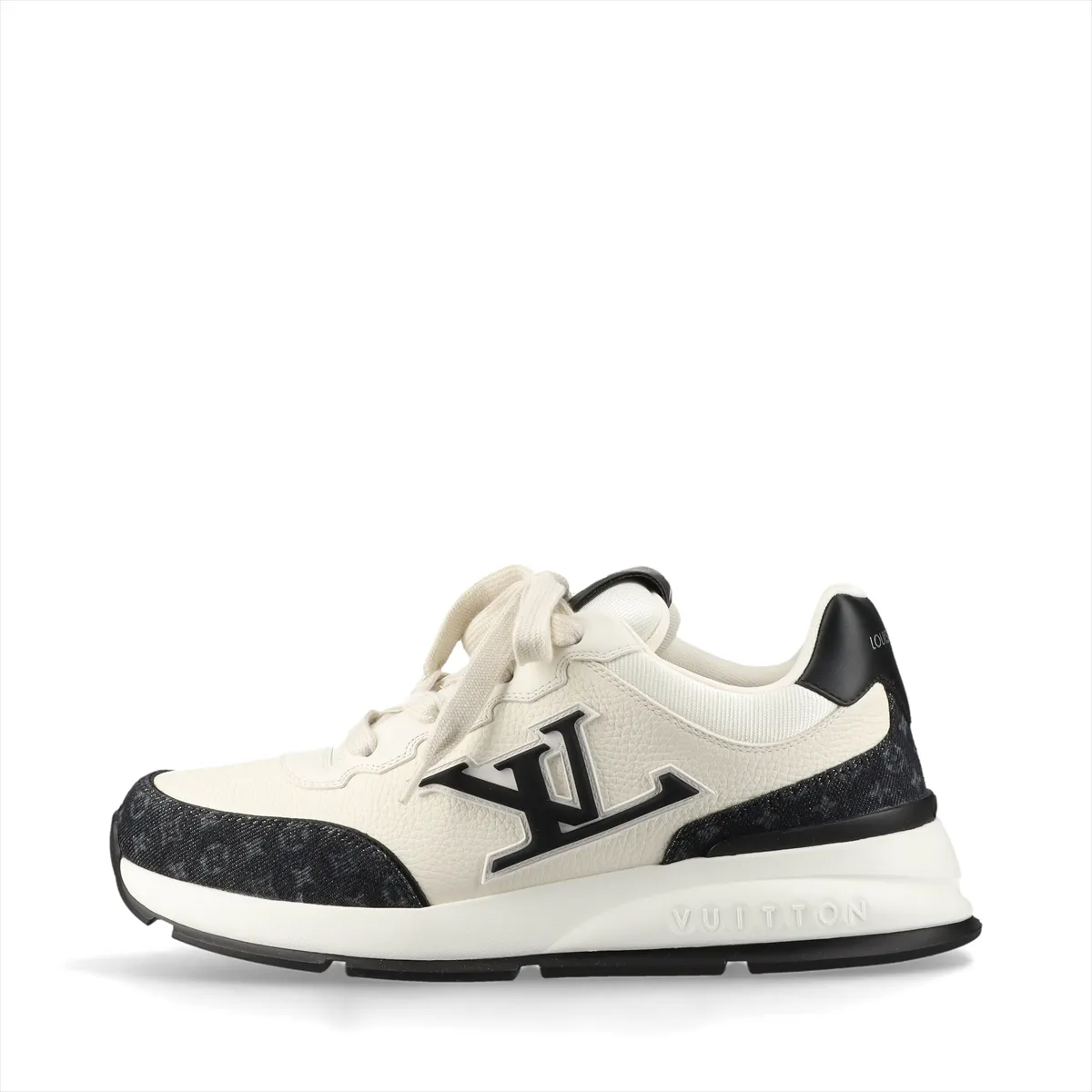 Black and ivory platform-soled sneakers in denim and leather with monogram patterning and a logo at the side.