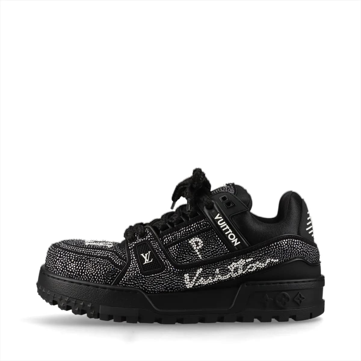 Chunky black and white suede high-top trainers with embellished logo detail and thick soles.