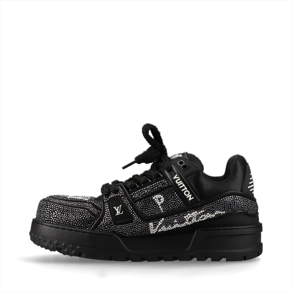 Chunky black and white suede high-top trainers with embellished logo detail and thick soles.
