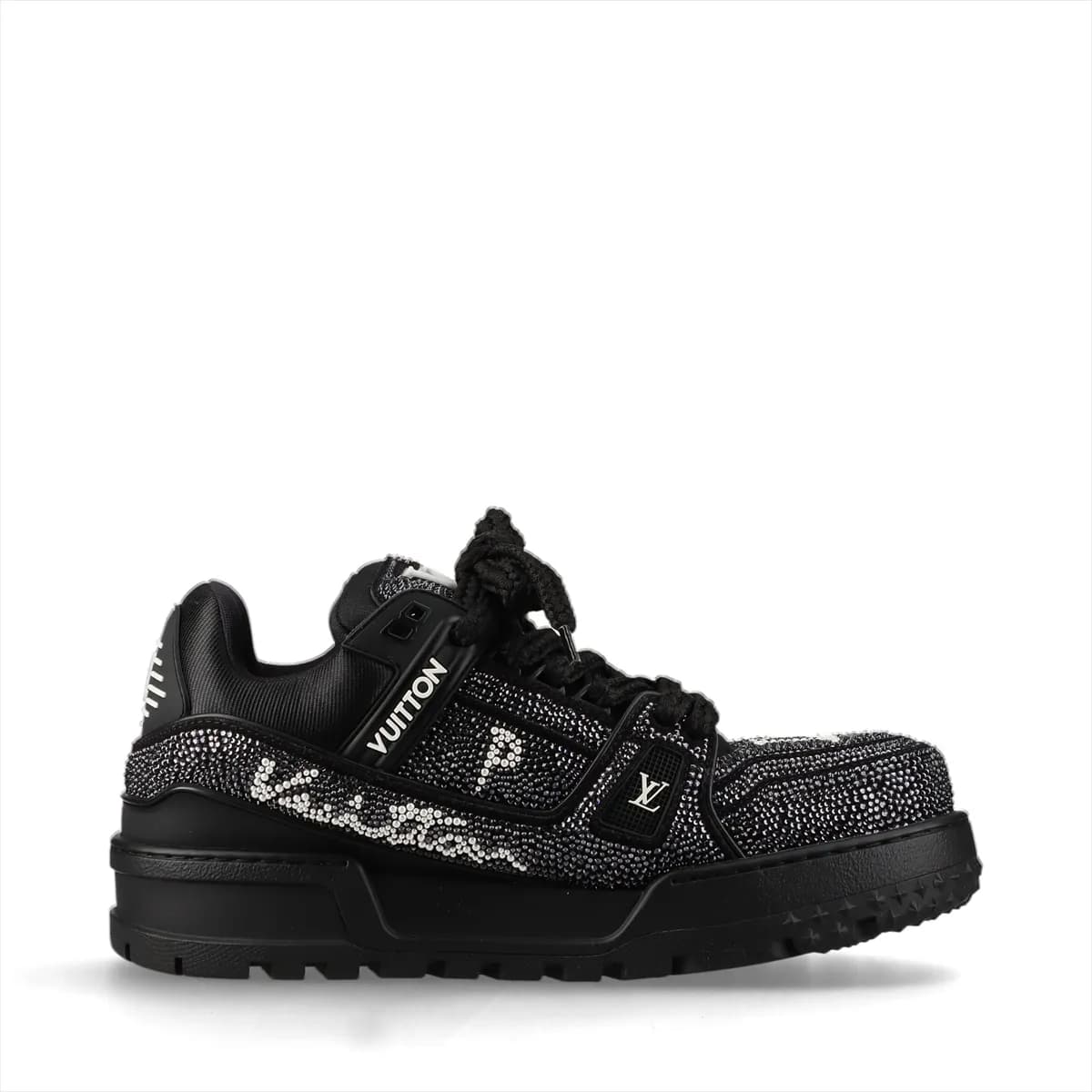 Chunky black and white suede high-top trainers with embellished logo detail and thick soles.