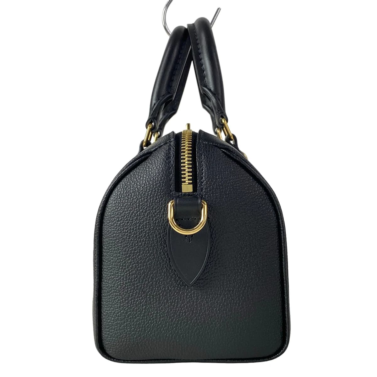 Embossed monogram leather handbag with top handles and a structured body.