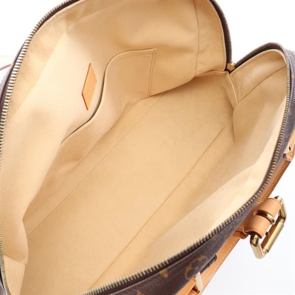 Structured brown monogram-pattern coated canvas handbag with twin leather handles and metal clasps.