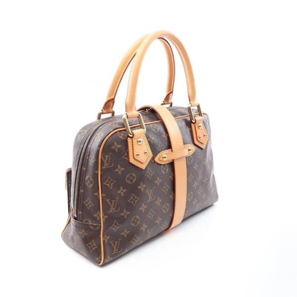 Structured brown monogram-pattern coated canvas handbag with twin leather handles and metal clasps.