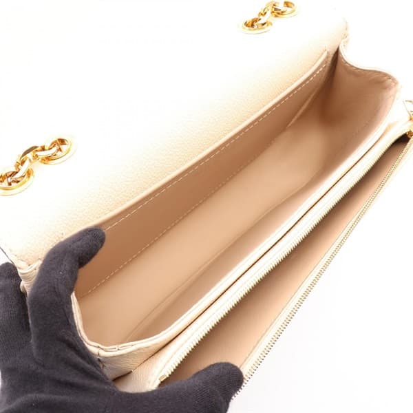 Cream embossed-leather shoulder bag with flap front and gold-tone hardware.