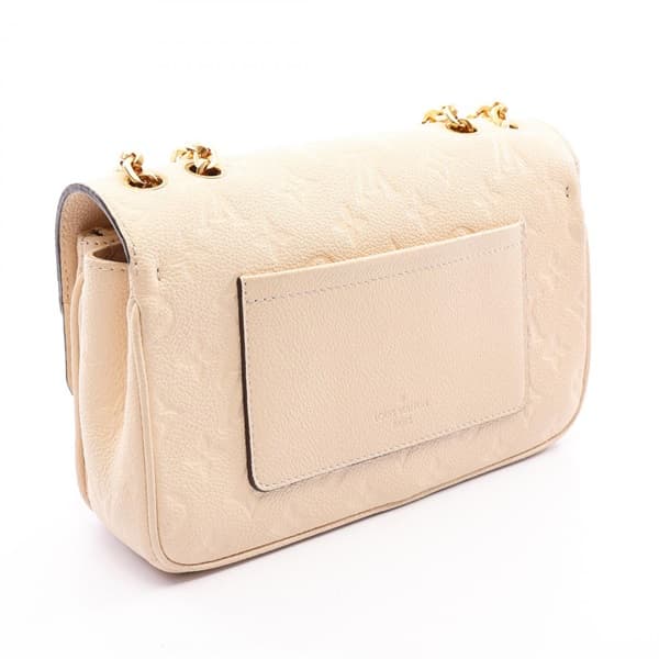 Cream embossed-leather shoulder bag with flap front and gold-tone hardware.
