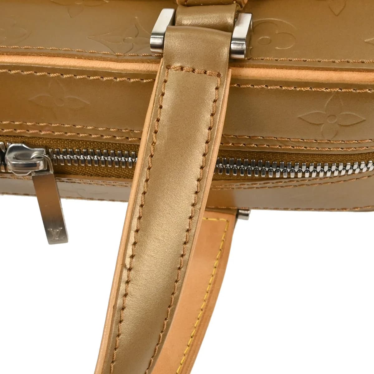 Embossed monogram leather handbag in pale gold with two short handles