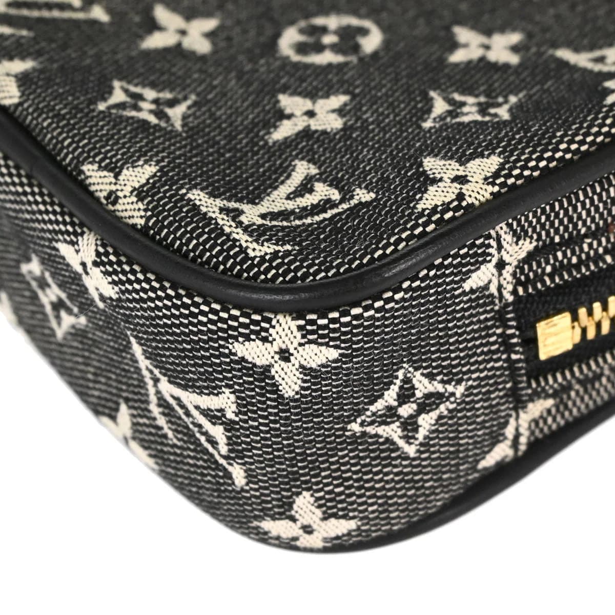 Black monogram-patterned fabric shoulder bag with leather trim and a single strap.