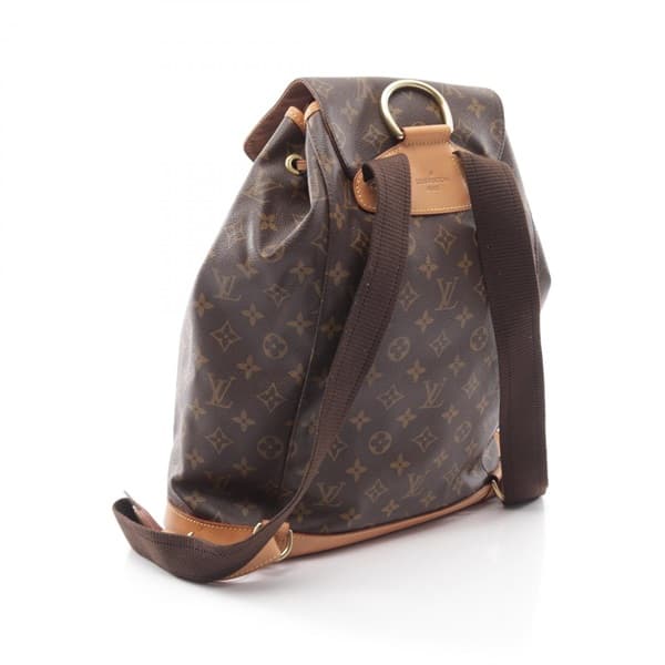 Brown monogram-patterned canvas backpack with leather straps and buckled flap pockets.