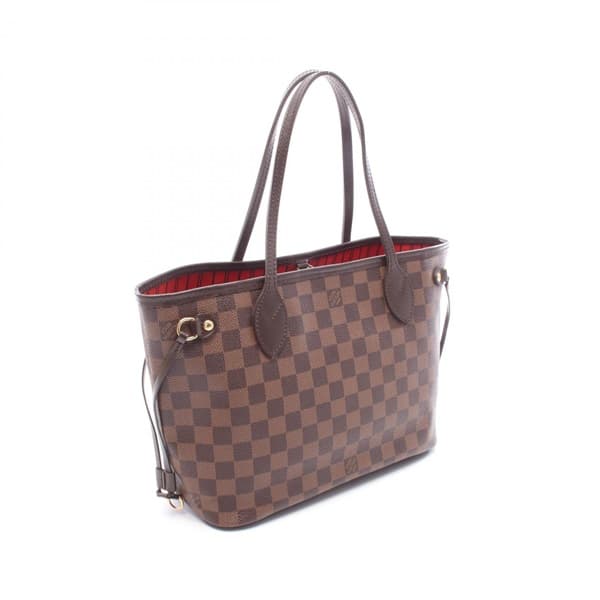 Brown checkered canvas open tote with long leather straps, standing upright.