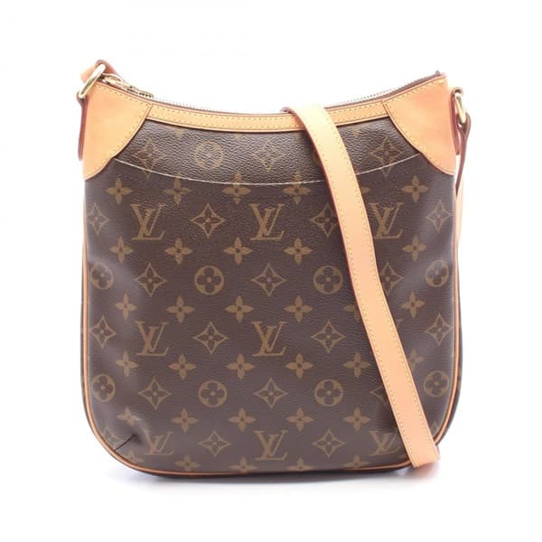 Brown monogram-pattern coated canvas flap crossbody bag with a wide adjustable strap.