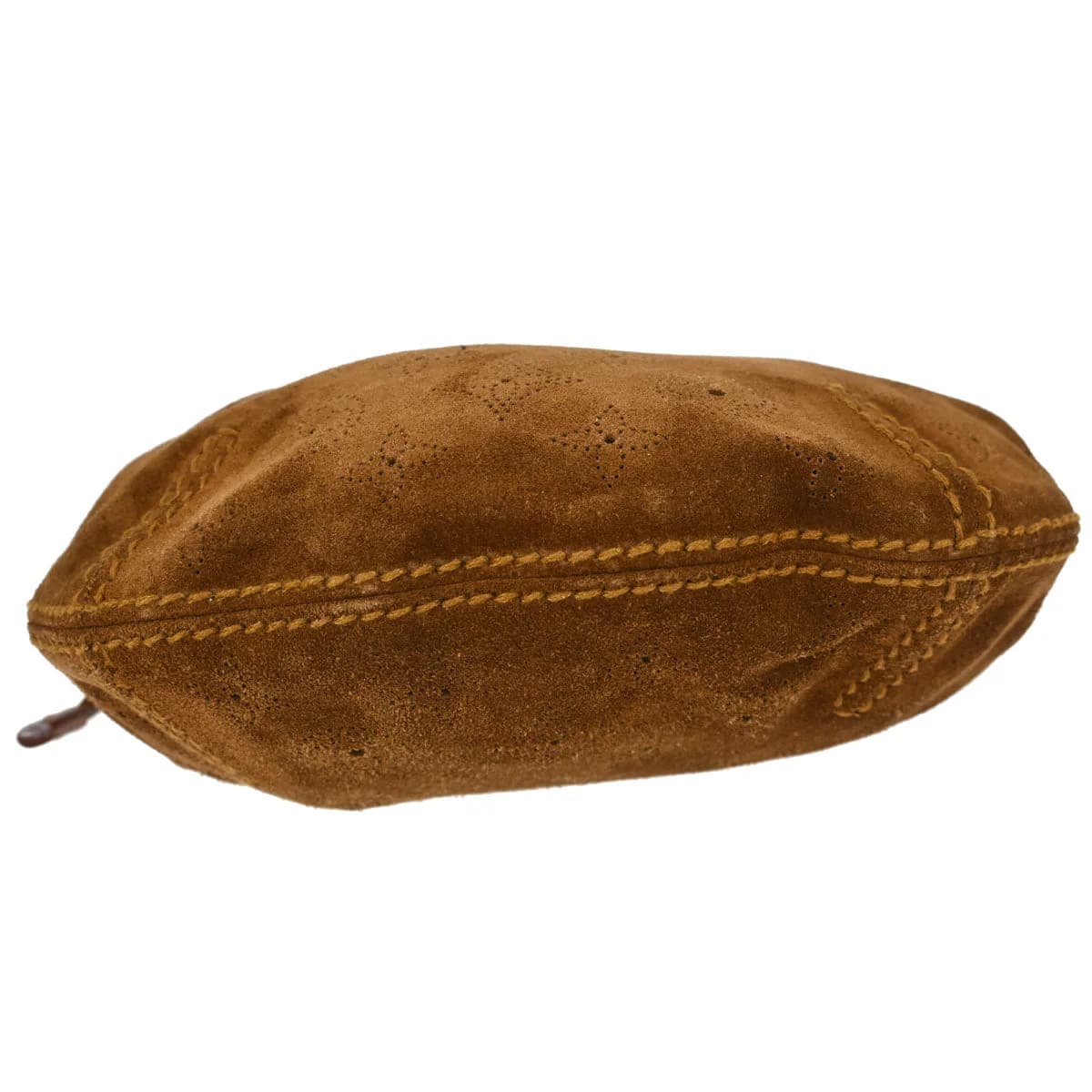 Soft brown suede handbag with embossed monogram pattern and leather-trimmed handles