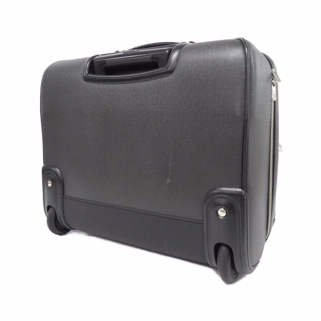 Rigid grained leather briefcase-style travel case with a top handle