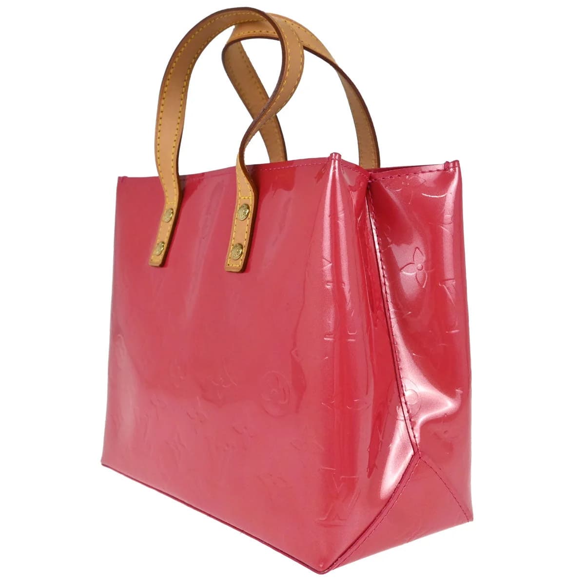 Compact glossy pink patent handbag with embossed monogram pattern and two short handles.
