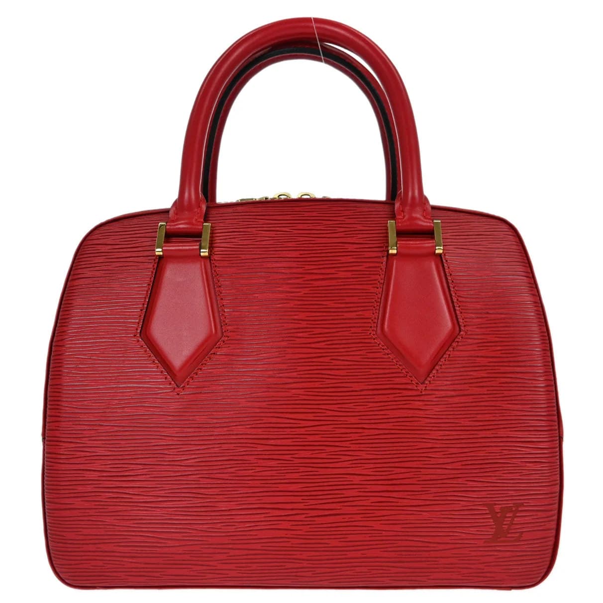 Small structured red textured-leather handbag with short handles and a flap top.
