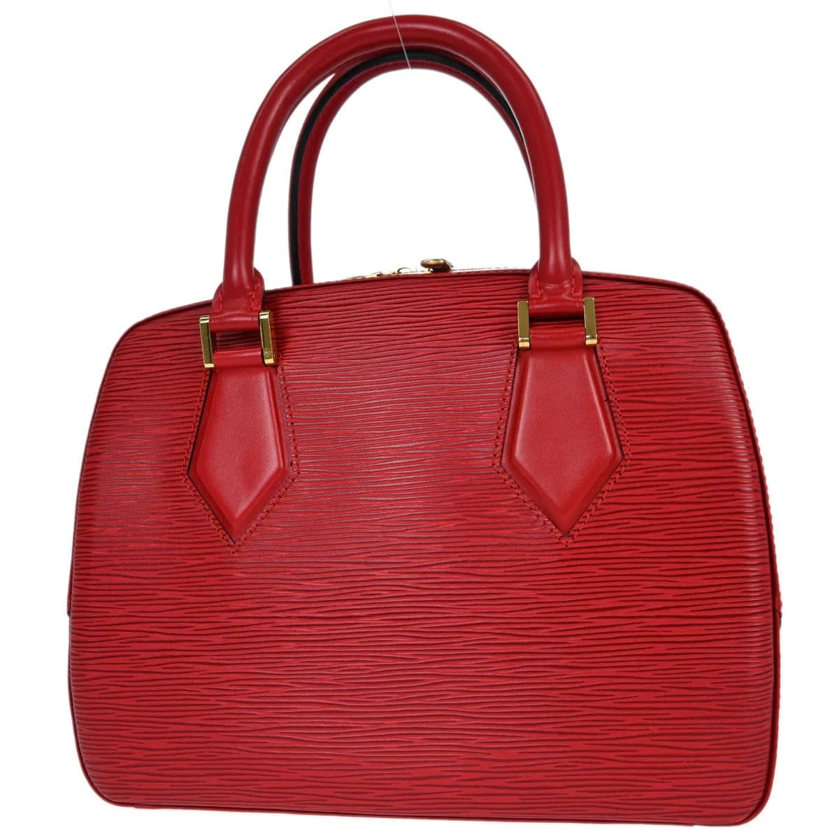 Small structured red textured-leather handbag with short handles and a flap top.