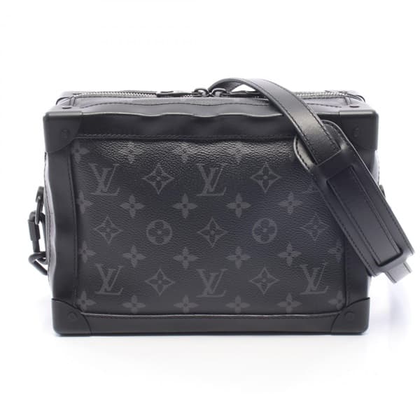 Rigid rectangular black bag with tonal monogram pattern and a wide strap.