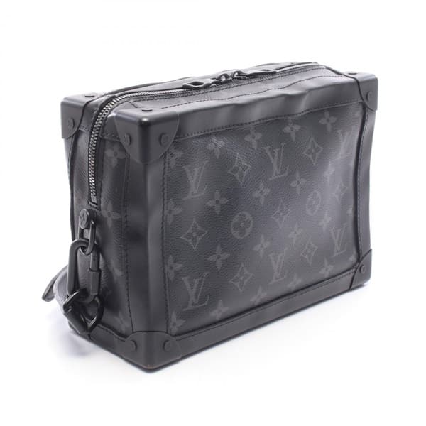 Rigid rectangular black bag with tonal monogram pattern and a wide strap.