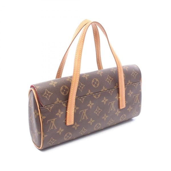 Small brown monogram-pattern coated canvas handbag with a short rolled handle and front flap.
