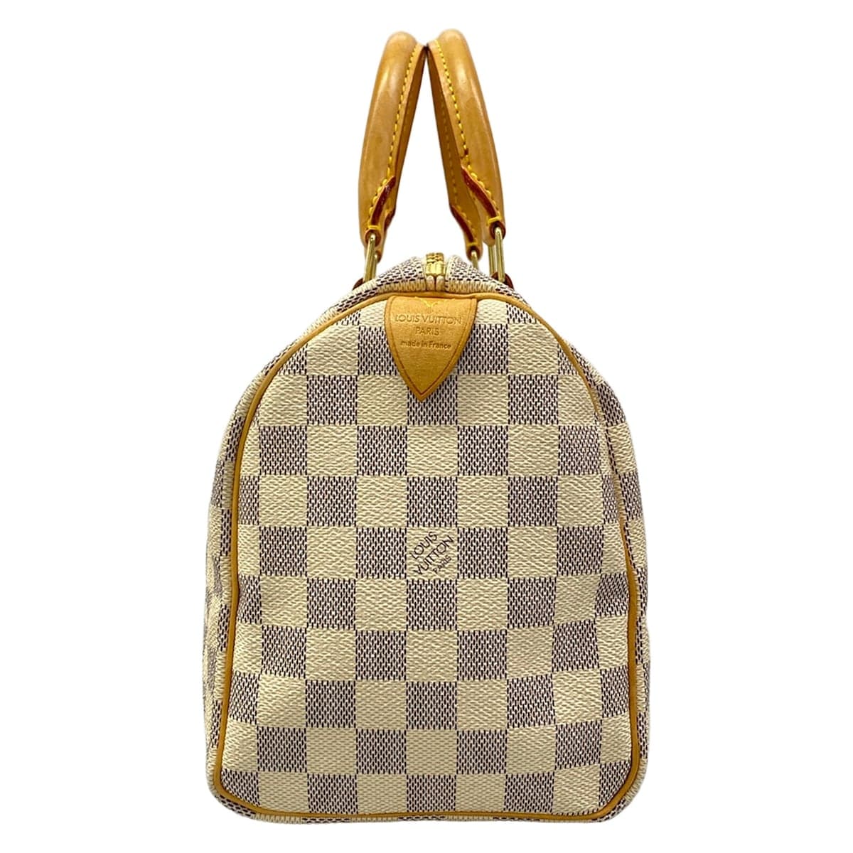 Pale blue and white checked canvas bag with natural leather handles and trim.