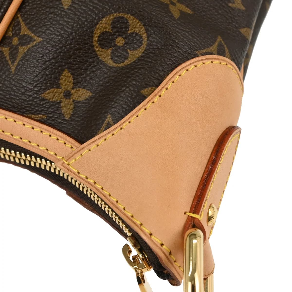 Brown monogram-canvas hobo bag with a single curved shoulder strap.