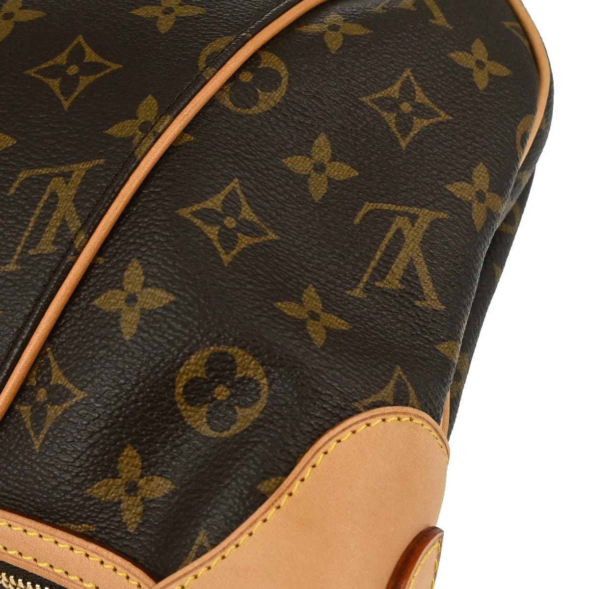 Brown monogram-canvas hobo bag with a single curved shoulder strap.