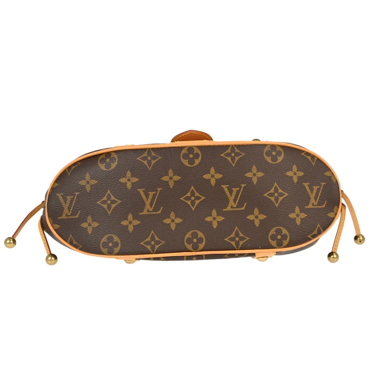 Brown monogram canvas handbag with tanned leather trim and a curved handle.